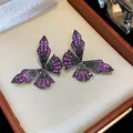 Elegant butterfly earrings with vibrant pink zircon stones in a dark metal setting - 62 Silver Post (Gun Black Pave Butterfly) / Gunmetal - Purple