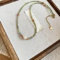 Halskette im Ethno-Stil aus Naturstein und Kristall mit einer weißen zentralen Perle - Herz-Anhänger-Stil (14#) / Grün
