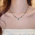 Elegant bohemian ethnic natural stone beaded necklace featuring a blue gem pendant - Blue-Green Oval Pendant Style (10#)