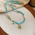 Handmade ethnic style turquoise beaded necklace with gold sun pendant accessory - Sun Pendant Style (19#)