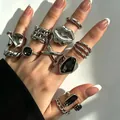 Vintage silver-plated geometric ring set with black gemstone accents worn on fingers - 11-Piece Vintage Geometric Industrial Style (32829-ring-S)