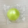 Pelota antiestrés de jarabe de malta verde con una textura traslúcida de rebote lento - 6cm / Amarillo Perlado
