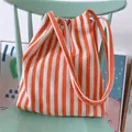 Sac à bandoulière en toile à rayures orange et blanches de style littéraire coréen - Orange
