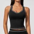 Bequemes schwarzes Yoga-Tanktop mit weißen Kontraststreifen und Racerback-Design - S / Tops / Premium Schwarz