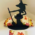 Détail d'un porte-serviette silhouette de sorcière avec serviettes d'automne - Sorcière