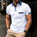 Business casual men's white polo shirt featuring blue contrast collar and chest pocket - White / S