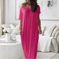 Detailed shot of a bright pink loose-fit short-sleeve maxi dress for casual summer wear - S / Tops / Rose Pink