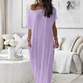 Vista dettagliata di un abito lungo viola a maniche corte con tasche laterali pratiche - S / Tops / Viola Chiaro