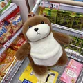 Gros plan d'un sac en peluche loutre de mer marron et blanc dans un chariot de course - Forme de Loutre (Sac Simple Épaissi Amélioré) / Kaki Foncé