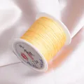 Spool of yellow 0.6mm non-elastic jade thread for DIY jewelry making and braiding - Beige 21