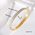 Gold stainless steel bangle bracelet featuring full rhinestone inlay design - Three Rows / 6mm (53*64) / Gold
