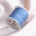 Light blue 73# non-elastic 0.6mm jade thread spool for DIY jewelry braiding and crafting - Haze Blue 56