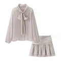 Elegant silvery-lilac long-sleeved two-piece set with bow-tie blouse and ruffled mini skirt - S / Top And Bottom / Silver Gray