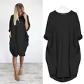 Robe midi décontractée et ample pour femmes avec de grandes poches latérales en noir - 3XL / Haut Et Bas / Noir