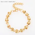 Vista detallada de pulsera de acero de titanio chapada en oro con diseño de nudo - Nudo De Perla De 75 Mm De Ancho - Dorado / Collar 40+5CM
