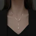 Elegante verstellbare Perlenkette in Y-Form mit Quastendesign für modebewusste Damen - Quastenperlenkette / Silber