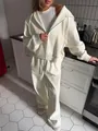 Dames crèmekleurig tweedelig trainingspak met hoodie met rits en broek met wijde pijpen - Geel / S