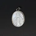 Detailed close-up of natural white mother of pearl carved Virgin Mary pendant jewelry - Virgin Portrait Style (aljylp1797) / Silver