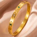 Detailed view of an 18K gold-plated titanium steel evil eye bangle with colorful zircons. - Evil Eye Style (30乙-B-8)