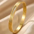 Detail view of gold-plated ridged stainless steel bangle with sparkling CZ stones - Triple Diagonal Stripe Style (44乙-D-8)