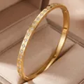 Close-up of 18K gold plated bangle with geometric diamond pattern and clear stones - Rhombus Diagonal Stripe Style (16-D-8)