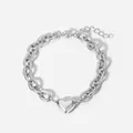Pulsera de cadena gruesa de acero de titanio plateado con un colgante de corazón - Pulsera / Color acero