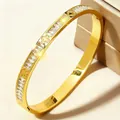 Elegante gouden roestvrijstalen armband met kristallen en uitgesneden klavermotieven - Goudkleurige Klavervorm met Strass (44B-E-6)