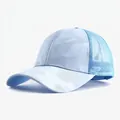 Detailed view of the light blue camouflage pattern and mesh back on a baseball cap. - Adjustable / Sky Blue
