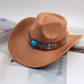 Close-up of a tan suede Western cowboy hat featuring a turquoise stone and floral band - Embroidered Gem Decor / Deep Beige