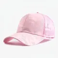 Close-up view of pink camouflage mesh baseball cap with breathable sun protection. - Adjustable / Pink
