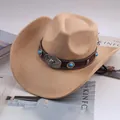 Close-up of a khaki Western cowboy hat featuring decorative turquoise and bull head emblem - Gem Bull Head Decor / Light Beige
