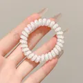 Élastique à cheveux spirale blanc avec confettis, anneau téléphone haute élasticité - 1#点点 / 外直径 5.5cm / Pois multicolores