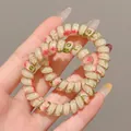 Deux élastiques à cheveux spirale fleurs haute élasticité pour coiffures de femmes - 3#粗款 / 约 5cm 2件装 / 鹅黄印花