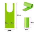 Green biodegradable dog poop bags in rolls with clear product dimension markings - Roll Vest Bag (Solid Unscented) / 15 Pcs/Roll (1.5 Micron) / Green