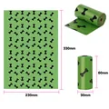 Green biodegradable dog poop bags with black bone pattern and dimensions 230x330mm - Eco Lavender Scent (Bone Print) / 15 Pcs/Roll (1.5 Micron) / Green