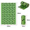 Green biodegradable EPI pet waste bags with black bone pattern showing 330x230mm dimensions - Eco Lavender Scent (Patterned) / 15 Pcs/Roll (1.2 Micron) / Green