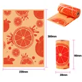 Biodegradable dog waste bags with orange citrus print and roll dimensions 60x28mm - Eco Orange Scent (Printed) / 15 Pcs/Roll (1.4 Micron) / Orange