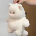Adorable chaton blanc en peluche avec une fourrure douce vue détaillée tenue en main - Chat blanc / Environ 4050 Cm