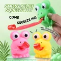 Jouet grenouille à presser avec langue extensible en plusieurs couleurs pour le stress - Grenouille Colorée À Gros Yeux