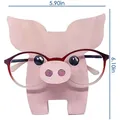 Pink pig wooden eyeglass holder stand with product dimensions 5.90 x 6.10 inches - Pig Eyeglasses