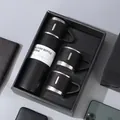 Coffret cadeau bouteille isotherme 500ml en acier inoxydable noir avec trois bouchons - Noir / 500ml