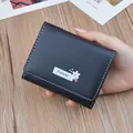 Élégant petit portefeuille noir pliant pour femme en cuir souple avec motif floral blanc - Noir