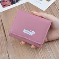 Petit portefeuille rose pour femme, pliable en trois, en cuir souple et texturé - Rouge Haricot