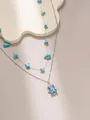 Elegante set di collane a doppio strato con pietre turchesi e ciondolo in pietra blu marmorizzata - Set Turchese