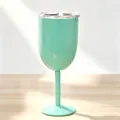 Detail view of mint green insulated stainless steel wine goblet with clear leak-proof lid - 10oz / Emerald