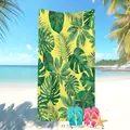 Telo mare in microfibra con stampa tropicale di foglie di monstera per vacanze al mare - Sfondo Giallo Foglie Verdi (11) / 50x100cm