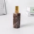 Sechseckige Sprühflasche aus dunklem Rauchkristall mit goldener Pumpe - Rauchquarz