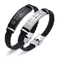 Close-up of engraved braided leather couple bracelets with stainless steel plates - Sun and Moon Design / Black
