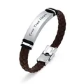 Close-up of braided brown leather bracelet with engravable stainless steel curved plate. - Brown Leather / Brown