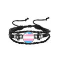 Detailed view of a multi-layer woven leather bracelet with transgender flag glass dome. - Transgender Pattern (PN2637-4) / Black